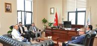 Armutlu Kaymakamı Uğur Sezer ve Belediye Başkanı Mehmet Birkan Rektörümüzü Ziyaret Etti